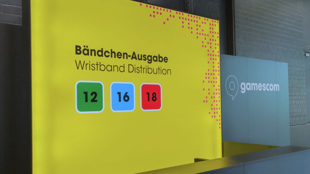 Ausgabestelle der Altersbändchen auf der gamescom